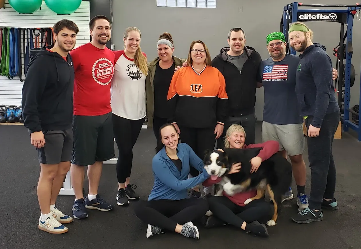 Solid Training members and the gym dog after a session